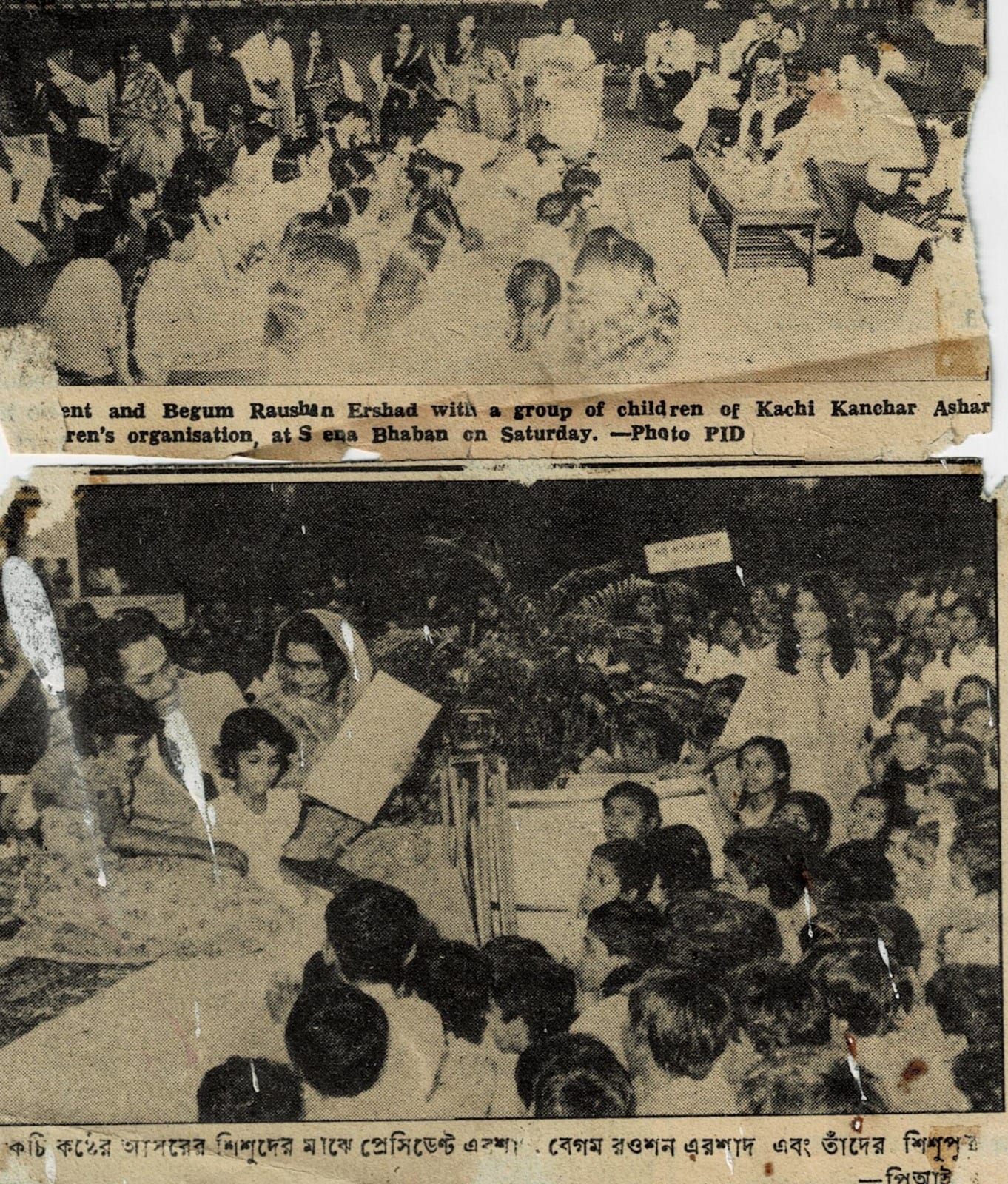 Two newspaper cuttings mounted one above the other, each showing a hall of seated children with adults among them