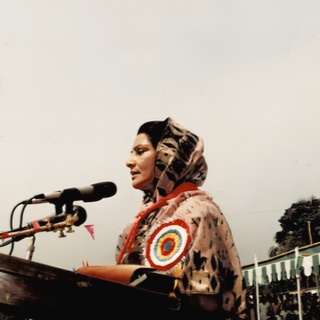 Woman speaking at a podium